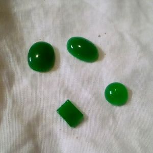 4 small Genuine Natural Emerald cab stones.